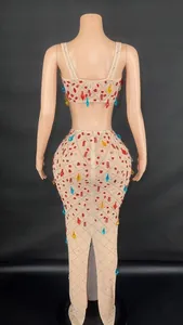 Back view of a sexy two-piece mesh dress set with colorful rhinestone embellishments