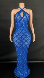 Detail showing blue halter gown with teardrop crystals and mesh diamond pattern for pageants.