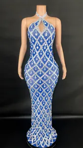 Elegant blue halter floor-length pageant dress with intricate silver crystal patterns