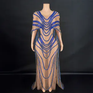Elegant floor-length nude mesh gown featuring blue sequined cape design and slim fit style