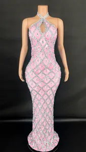 Close-up detail of the pink halter dress with silver sequins and teardrop rhinestones.