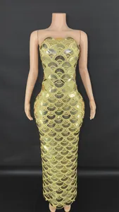 Detail of gold sequin strapless bodycon maxi dress with fish scale pattern