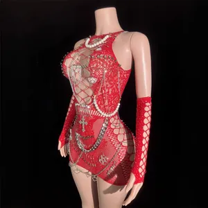 Red hollow out fishnet mini dress with punk metal chains and safety pin charms