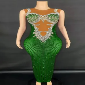 Exquisite green floor-length performance dress featuring sparkling rhinestone details