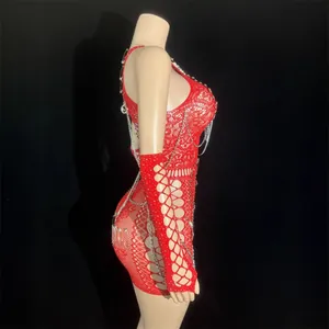 Sexy red hollow out mini dress with chain details and cutout sleeves for party wear.