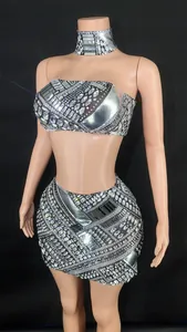 Detailed view of luxury silver rhinestone strapless tube top and mini skirt two-piece set