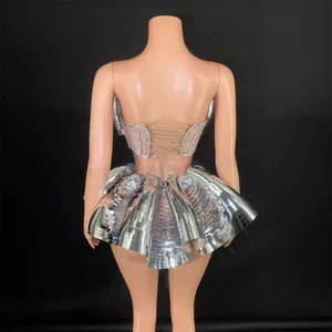 Sexy silver mirrored stage outfit with rhinestone corset shown on mannequin back view