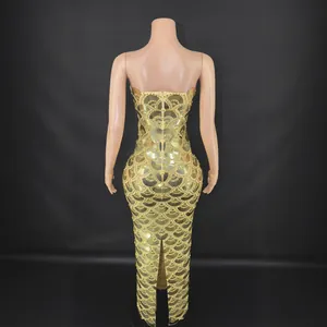 Elegant gold sequined mermaid evening gown with strapless design and slim fit cut