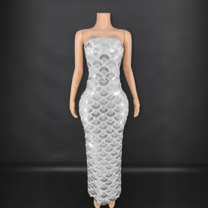 Elegant silver scalloped sequin strapless evening gown for formal parties and events.