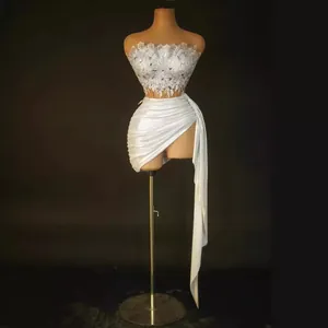 Two-piece elegant silver sequin tube top and white high-waist pleated mini skirt