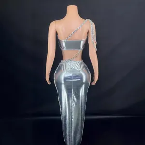 Silver metallic two-piece set with rhinestone one-shoulder top and long bodycon skirt