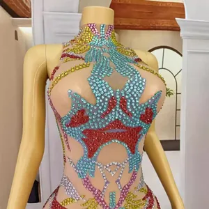 Vibrant colorful rhinestone-embellished bodycon mock neck mini dress displayed on a mannequin