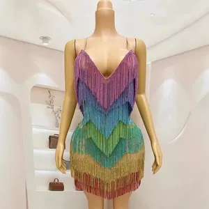 Elegant vibrant rainbow fringe mini dress with sparkling rhinestones and backless design
