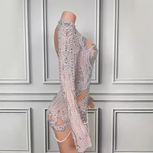 Elegant long sleeve mini dress with heavy rhinestone and pearl embellishments