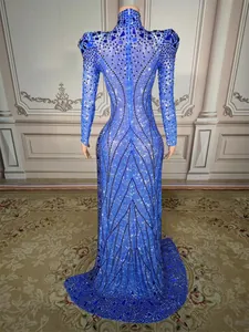 Back view of elegant blue sequin and rhinestone high-neck long sleeve evening gown