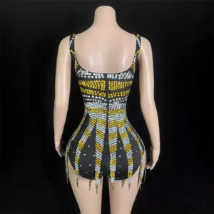 Sleeveless backless bodycon mini dress featuring intricate gold and silver rhinestone stripes