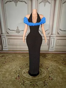 Full-length slim fit black sleeveless evening dress with blue floral shoulder accents.