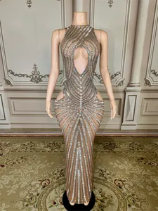 Detailed view of luxury rhinestone mesh floor-length gala dress for parties