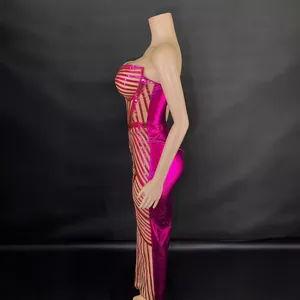 Rose red strapless bodycon evening gown with fishbone detail and mesh striped panels