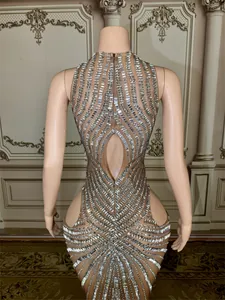 Elegant mesh evening gown featuring silver rhinestones and a sexy back cutout detail view