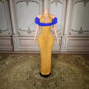 Elegant yellow rhinestone evening gown with blue off-shoulder ruffles for formal events.