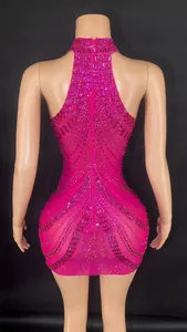 Back view detail of hot pink rhinestone halter mini dress for stage performances