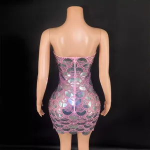 Elegant pink strapless mini dress featuring shimmering silver sequin fish scale patterns