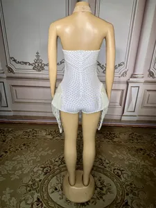 Exquisite back view of a white pearl-embellished bodysuit with elegant fringe tassels