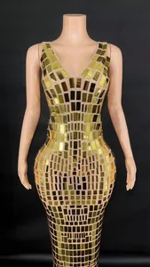 Detailed view of a gold mirror sequin bodycon evening party dress on mannequin