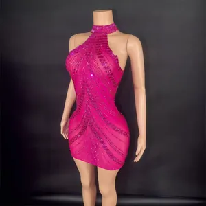 Vibrant pink halter mini dress with full rhinestone embellishments for performances