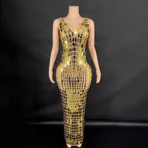 Stunning sparkling gold sequined floor-length evening gown for parties and nightclubs