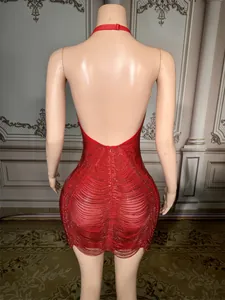 Detailed back view of a red mini dress featuring intricate rhinestone fringe detailing