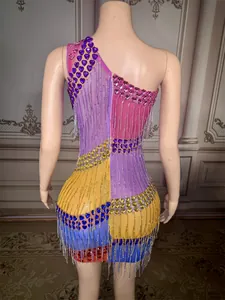 Back view of a one-shoulder mini dress with colorful rhinestones and metallic hanging fringes