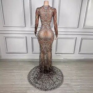 Elegant floor-length evening gown with long sleeves and shimmering luxury rhinestones