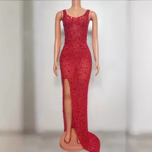 Elegant red sparkling rhinestone evening gown with a high side slit and slim fit