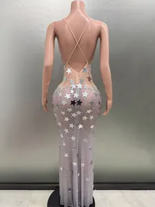 Detailed back view showing the silver star sequin pattern on a sheer mesh evening party dress