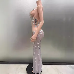 Sparkly sleeveless backless sequin evening dress with silver stars on nude mesh
