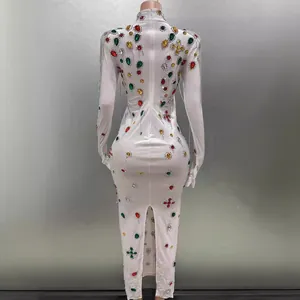Elegant white bodycon evening gown with colorful rhinestones, fringe and matching gloves