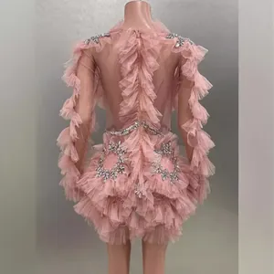 Elegant pink mesh ruffled mini dress with sparkling rhinestone details for evening wear.