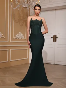 Elegant emerald green mermaid evening gown with strapless sweetheart neckline and sequins
