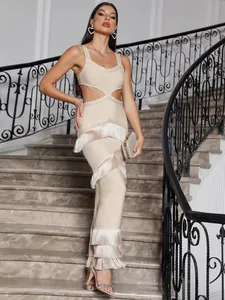 Exquisite detailed view of apricot layered tassel bandage maxi dress with sexy waist cut-out