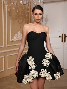 Elegant black strapless bandage dress with 3D white floral appliques for evening parties.