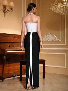 Back view of a chic black and white sleeveless bandage maxi dress for formal events.