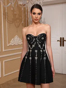 Elegant black strapless party dress with heavy rhinestone floral embroidery detail