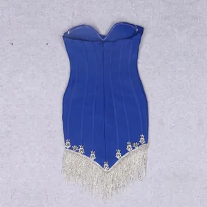 Back view detail of blue strapless bandage mini dress with silver fringe and crystal trim.