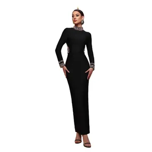 Elegant black long-sleeve evening gown with beaded collar, cuffs and slim bandage fit design