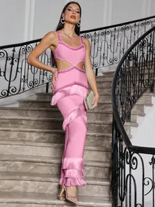Detailed look of pink camisole bandage dress with layered fringe and waist cutout