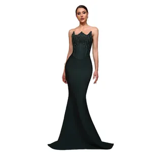 Elegant emerald green strapless mermaid evening gown with sequined bodice and long train