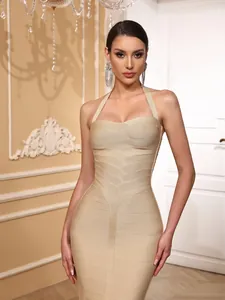 Elegant champagne sleeveless halter bandage dress with a slimming bodycon fit for formal parties