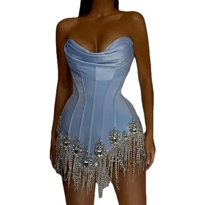 Elegant light blue corset mini dress with rhinestone embellishments and silver fringe